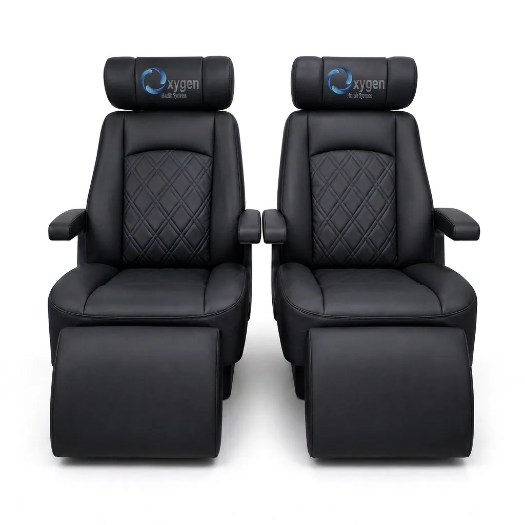 Black quilted leather reclining chairs with extended footrests